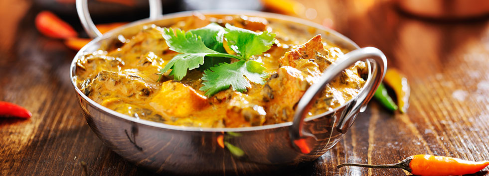 Takeaway curry dish balti hut ne12