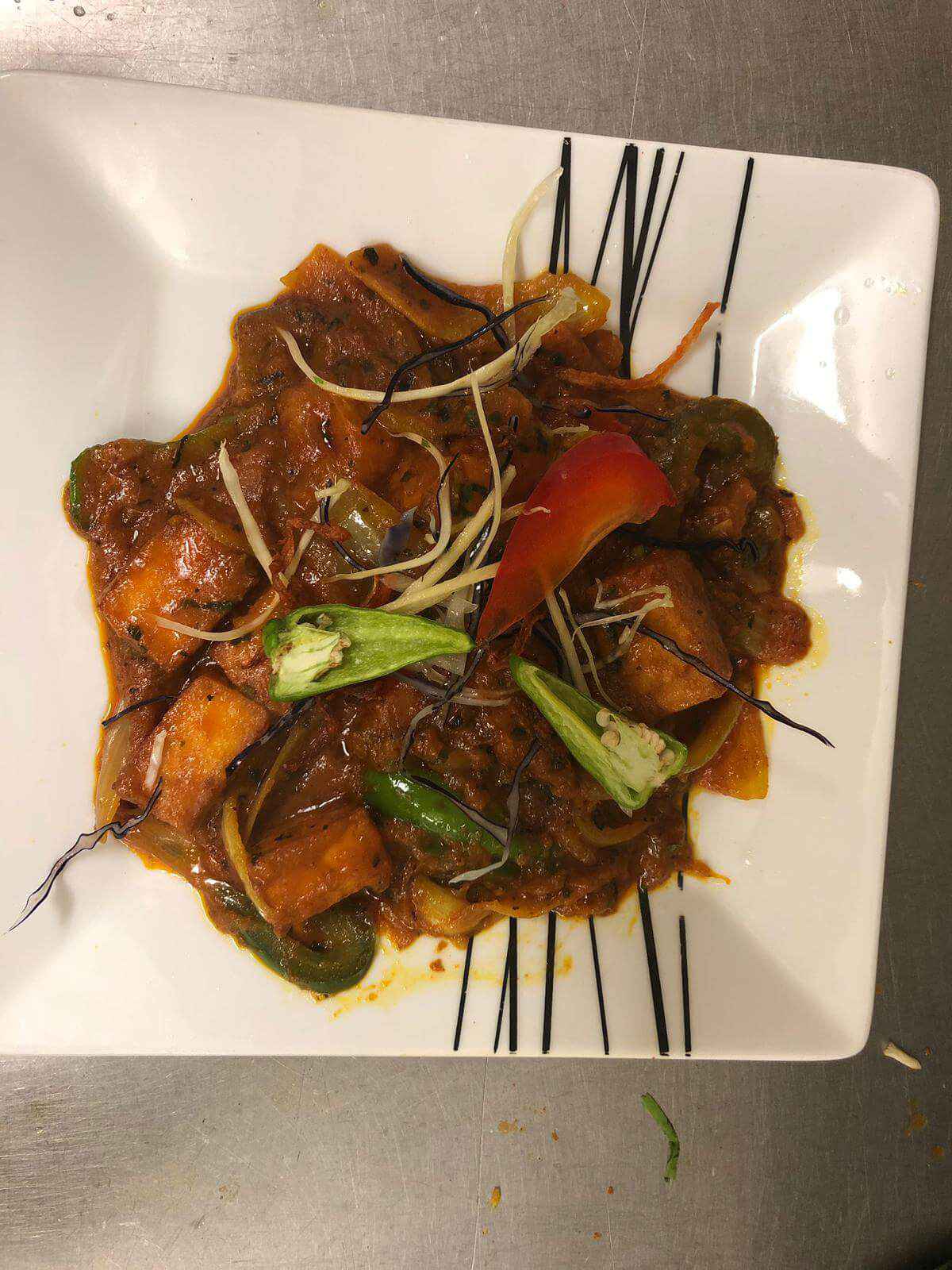 4. Takeaway curry Khan Restaurant KT17